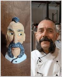 Can you spot the difference? 👀 @darkowlwoodworks made this awesome wood  carving of Chef Shawn and we absolutely love it! 😍 Come see him