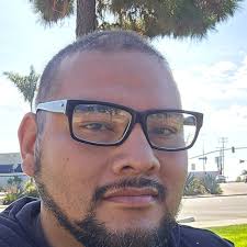 What is the walking distance from the parking lot to Hilton Field?