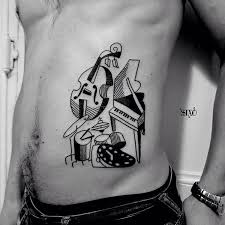 Enter the answer length or the answer pattern to get better results. Nice Grand Piano With Drum And Guitar Tattoo On Side Rib