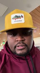 Kikuyu Men Choosing Their Caps