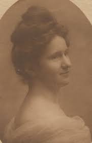 GEORGE C. BUTLER (1853-1927) (Left) AND CATHERINE ISABELLE LANCASTER BUTLER  (1858-1941) (Extreme Right) pose in a photo with grandchildren circa 1916  in a magnified view. This location is at the farm of