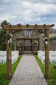 Ceremony Site At Zukas Hilltop Barn Garnick Moore Photography Arbor Decor Barn Wedding Event Inspiration