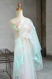 1 Yard Iridescent Holographic Gauze Fabric Magic Organza Fabric Wedding Dress Background Fabric Party Decor Diy Supplies Wholesale Fabric In 2021 Iridescent Dress Holographic Dress Dresses