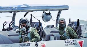 Pilots of the 'Escuadron Aereo 204' getting ready to takeoff aboard the T6C  Texans II in Chihuahua, Mexico. This unit also participated in a combat  mission during the operation to capture cartel