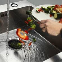 Waste disposal units are normally fitted directly to the bottom of the kitchen sink and grinds the soft waste (such as vegetable peelings, tea bags, fruit stones, fruit skins, nutshells, corncobs, crust etc.) to a pulp before it is flushed down the waste pipe by flowing water to the drain. Waste Disposal Units Sinks Taps Com