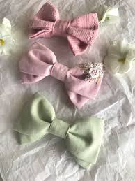 These headbands a so soft and stretchy! Embroidered Bows Floral Bow Custom Bow Baby Bow Bow Headband Bow Clip Hair Bow Linen In 2021 Embroidered Hair Bows Baby Bows Diy Fabric Bow