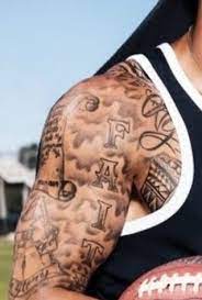 An nfl qb with tattoos shouldn't be all that shocking. Colin Kaepernick S 13 Tattoos Their Meanings Body Art Guru