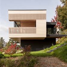 Quebec Studio Anne Carrier Architecture Has Designed A Dwelling Comprising A Collection Of Rectangula Canadian House Montreal Architecture Saint Lawrence River