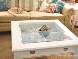 The table was designed to look like the arrows of a compass. Seashell Display Table Ideas I Love Shelling