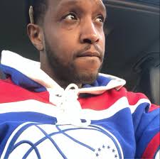 People running in front of guns