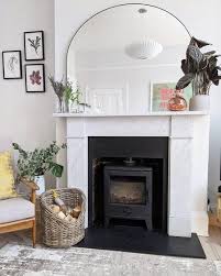 some more from the islingtonproject we replaced the fireplace with a log burner the large fireplace mirror wall mirrors over fireplace mirror above fireplace