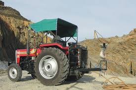 The Mf 241 Di From Tafe Equipped With A Compressor Fitted With A Rock Drill Used To Carve Holes In Rocks Tractors Antique Tractors Massey Ferguson Tractors