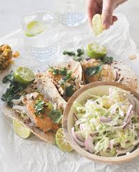 Stuff each warm tortilla with a layer of cabbage and salmon and garnish with the cucumber salsa and jalapeno aioli. Baja Style Fish Tacos Cabbage Cucumber Slaw With Heirloom Salsa Found By Fraulein