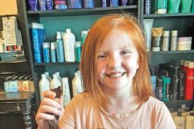 Brophy donates hair for a child in need