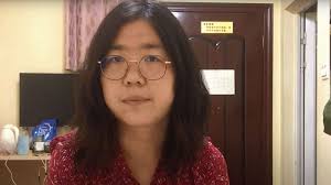 Rayhan asat in front of her brother ekpar asat's portrait in september. Missing And Incarcerated What Is Happening Within China S Borders Abc News