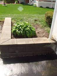 Small Retaining Wall Along A Driveway Small Retaining Wall Retaining Wall Outdoor Decor