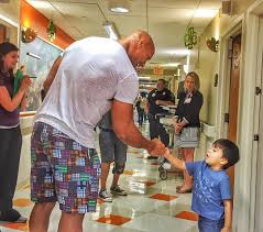 Dwayne 'the rock' johnson has revealed that he used to be asked if he was 'a boy or a girl' when 'i sit down next to a kid, and within 60 seconds, he goes, can i ask you something? i said, yeah. Baywatch Break Dwayne Johnson Pays Surprise Visit To Sick Kids Ilink2media