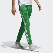 Black And Yellow Adidas Track Pants Inspired By The Adidas Superstar Shoe The Sst Tracksuit Was Designed In 1979 For Tennis Training It Wa Adidas Track Pants Tracksuit Pants Adidas Street Style