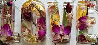 One of our favorites is preserving flowers in resin. Flower Petal Resin Initials Large Flower Petals Dried Flowers Wedding Wedding Initials