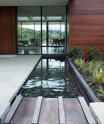Renovating the existing wading pool to provide a zero depth entry, small train themed toddler slide as well as a toddler. Exquisite Reflecting Pools For A Fluid And Tranquil Home