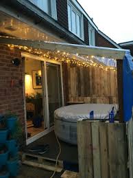 We Love The Use Of Recycled Materials To Create This Cosy Home For A Lay Z Spa Hot Tub Outdoor Hot Tub Cover Portable Hot Tub