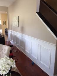 If you don't like that look, i would recommend removing the chair rail. Diy Faux Wainscoting Frills And Drills