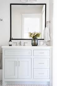 Black And White Bathroom With Light Blue Accents Features A Light Blue Washstand Painted Benjamin Moore Woodlawn Blue And Topped With A Whi With Images White Vanity Bathroom