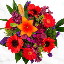 There are many flowers to choose from for a funeral. Sunset Bliss Floral Arrangement