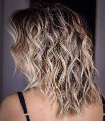 70 Best Variations Of A Medium Shag Haircut For Your Distinctive Style Beach Wave Hair Curled Hairstyles For Medium Hair Medium Shag Haircuts