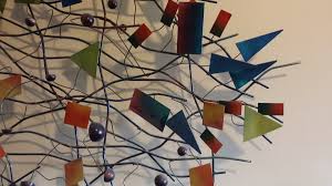 There are rings to facilitate hanging to the verso. C Jere Wall Metal Sculpture Collectors Weekly