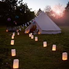 These Brilliant Fire Retardant Paper Bags Punched With A Star Shaped Graphic Create A Soft Romantic Glow Pl Candle Bags Tent Glamping Unusual Wedding Venues