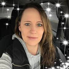 What campgrounds near Wausau, Wisconsin, have wooded sites, a playground,  and a sandy beach?