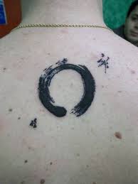 Maybe you would like to learn more about one of these? Beautiful Black Ink Zen Circle Tattoo On Back Truetattoos