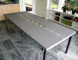 Make a long dining table feel fresh with dining benches. Concrete Rock Dining Table By Trueform Concrete Contemporary Dining Room New York By Trueform Concrete Llc Houzz