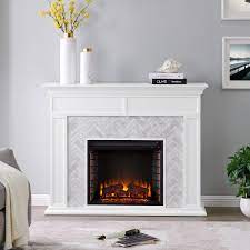 The black marble fireplace with orange veining is a genuinely fresh and unexpected feature worth coveting. Southern Enterprises Doris Marble Tiled 50 In Electric Fireplace In White And Gray Hd013909 The Home Depot