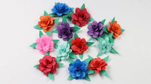 These flowers are so easy to make and are beautiful for diy decorations for weddings, birthday parties, showers and more! How To Make Small Paper Rose Flower Diy Paper Crafts Paper Roses Paper Flowers Diy Paper Crafts Diy