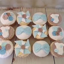 Baby shower cupcakes for boy. Cute Baby Shower Cupcakes By Buttercream Beauties Crochet Bow Mould Karen Davies Sugarcraft Button Moul Baby Cupcake Cupcakes For Boys Baby Shower Cupcakes