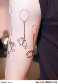 Rabbits And Balloons Tattoo On A Man S Arm Balloon Tattoo Rabbit Tattoos Unique Tattoos