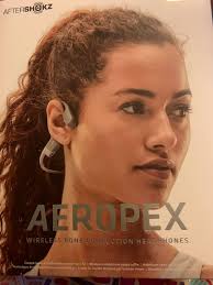 Have you tried bone conductive headphones?