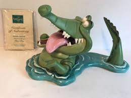 Pin By Treasurehouse Store On Disney Figurines Peter Pan Crocodile Peter Pan Disney Peter Pan