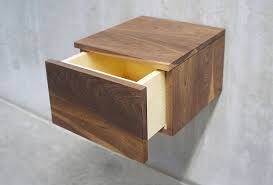 A modern floating cabinet nightstand with a drawer and additional shelf on the right side is a great solution for most of the bedrooms. 10 Easy Pieces Wall Mounted Bedside Shelves With Drawers The Organized Home
