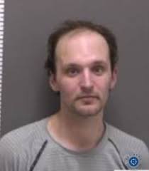 Fargo Man Charged with Felony Theft After Stealing Wallet from Open Garage 
