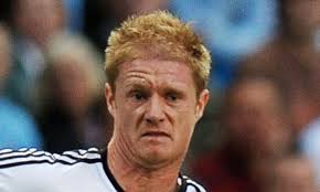 Michael Laudrup's agent hits back in row with Swansea defender Alan Tate,  telling him to 'shut up'