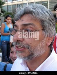 Paraguay's President-elect Fernando Lugo, left, a former Bishop, holds a  mug of mate, a traditional herbal drink, as he meets with Nuncio Orlando  Antonini in Asuncion, Wednesday, July 30, 2008. Lugo has