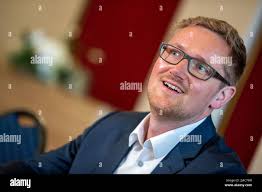 Schwerin, Germany. 27th Sep, 2021. David Wulff, secretary general of the  FDP in Mecklenburg-Western Pomerania, stands in a castle corridor after the  state press conference