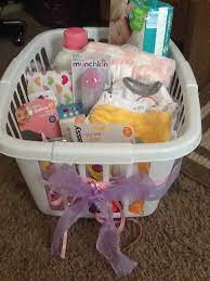 Easy Cute Baby Shower Gift Idea Used A Plain White Laundry Basket Couldn T Find A Purple Or Pink One Baby Shower Baskets Diy Baby Shower Gifts Baby Shower