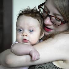 Nursing moms fight for insurance coverage of breast-feeding benefits