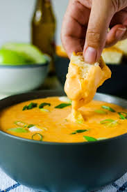 This Beer Cheese Dip Is Perfect For Football Parties Serve It In Your Slow Cooker Or Fondue Pot To Keep It Bub Beer Cheese Dip Hot Beer Cheese Dip Beer Cheese
