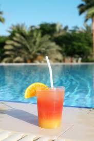 Cocktail Tropical Cocktail Against A Swimming Pool Sponsored Tropical Cocktail Cocktail Pool Swimming Ad Cocktails Fruits Images Stock Photos