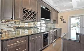 When using a mirrored backsplash, don't shy away from mosaic tile. Mirror Backsplash For Wet Bar Or Kitchen Design Build Planners